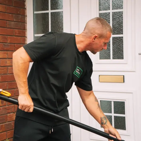 Ant working the pole at a customer's front door